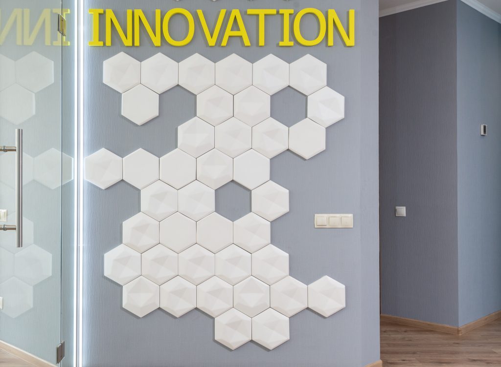 Startup company wall with the word innovation plastered on it